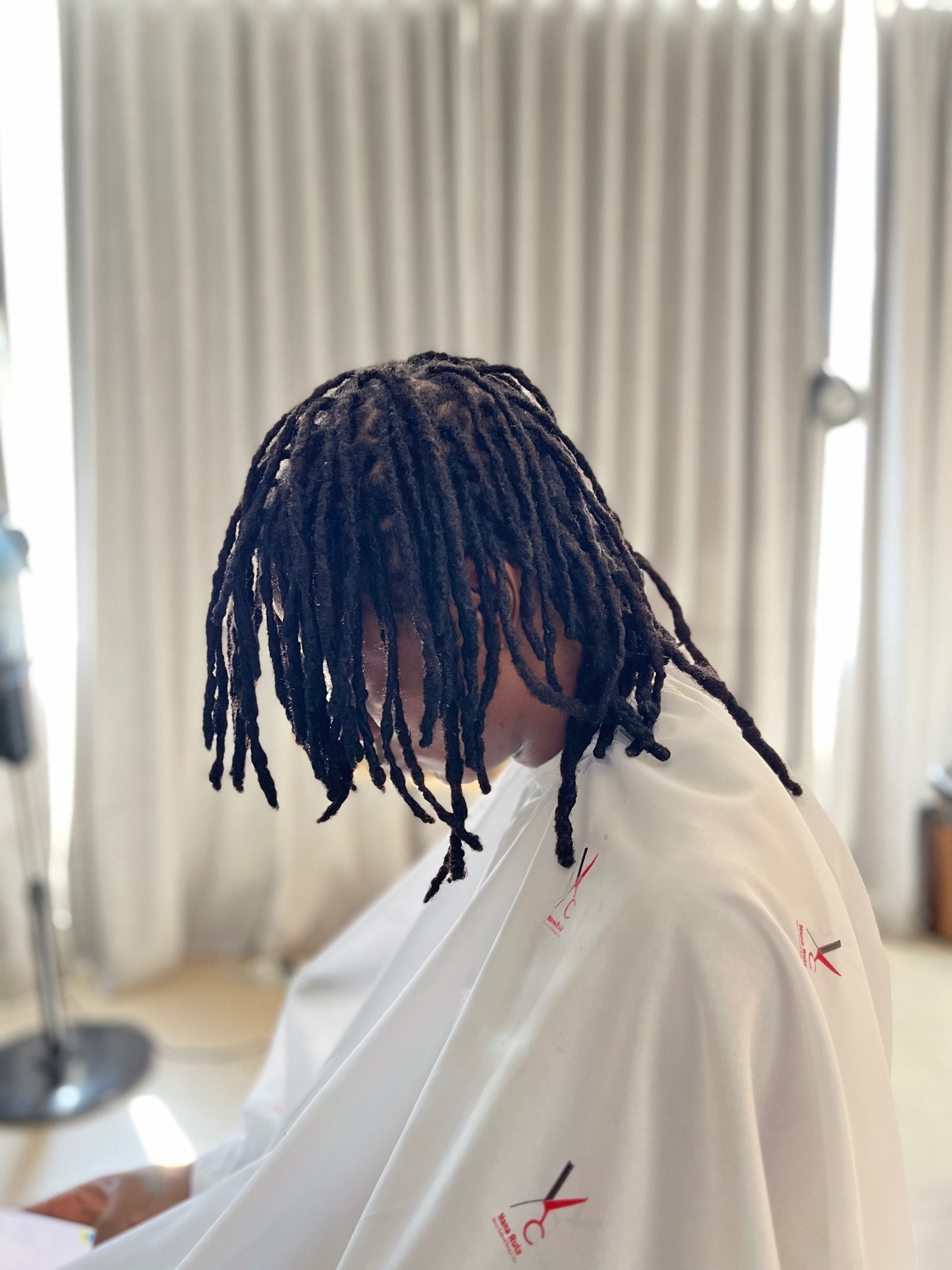 Fresh dreadlock retwist styling